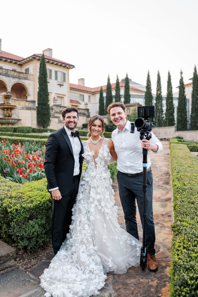 John Bunn with a couple at a villa